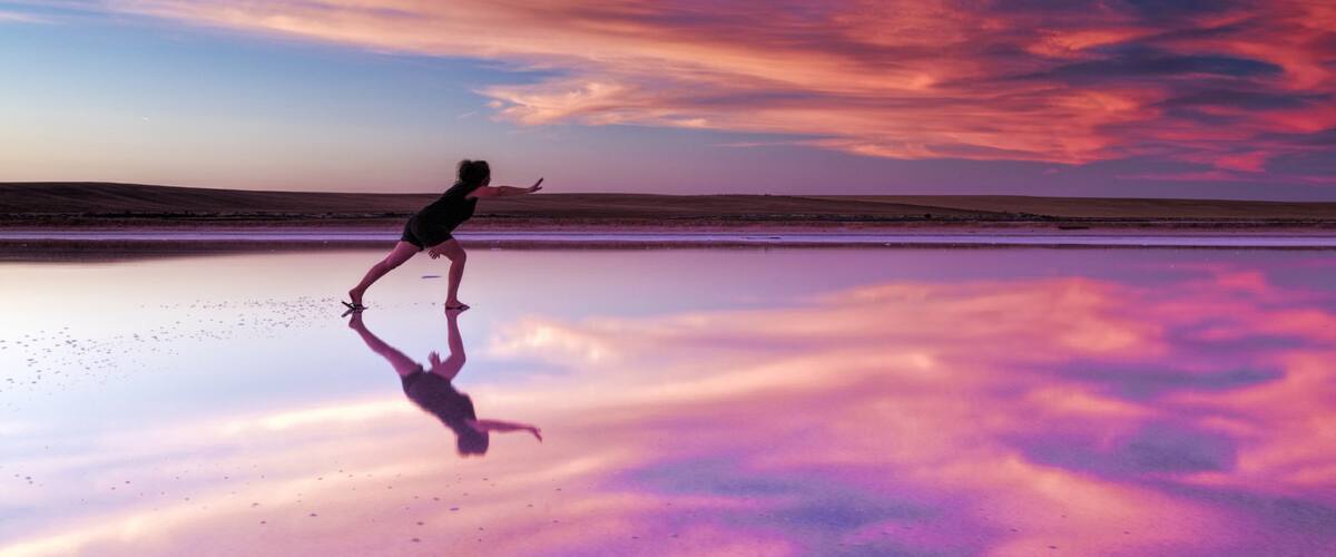 Swan Hill which includes a sunset as well as an individual female