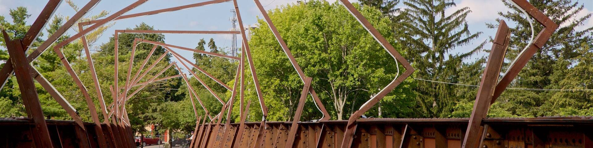 Adado Riverfront Park featuring a bridge