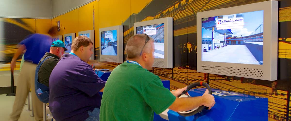 NASCAR Hall of Fame showing interior views as well as a small group of people