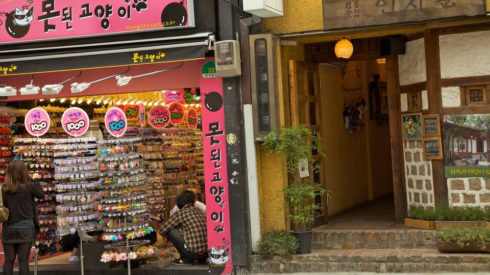 Insadong which includes street scenes, signage and markets