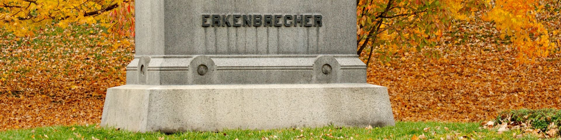 Spring Grove Cemetery showing a cemetery, autumn colours and a statue or sculpture