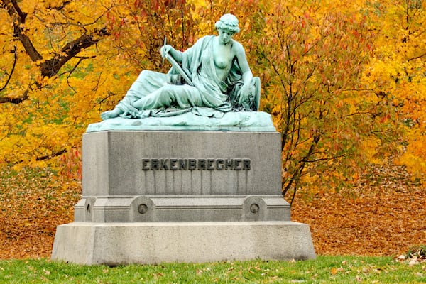 Spring Grove Cemetery showing a cemetery, autumn colours and a statue or sculpture