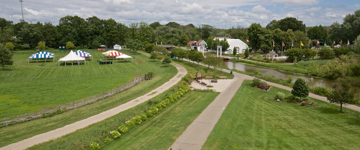 Windmill Island featuring a garden as well as a couple