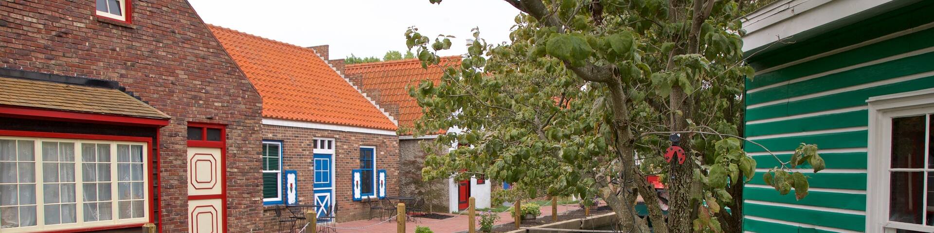 Dutch Village which includes a river or creek and a small town or village