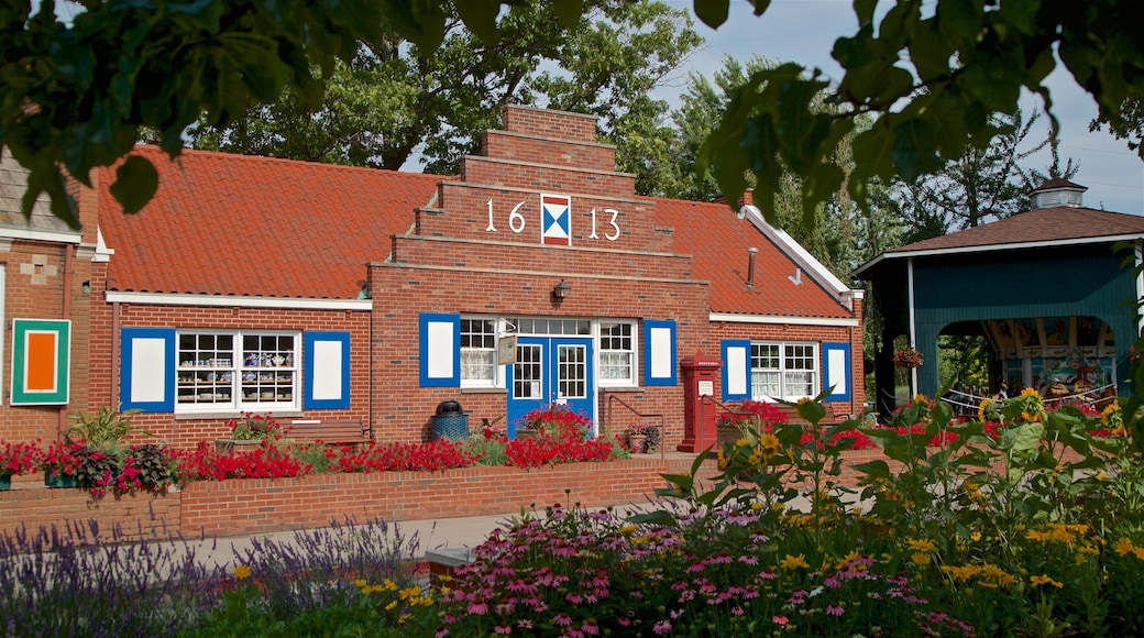 Windmill Island which includes a small town or village and wild flowers