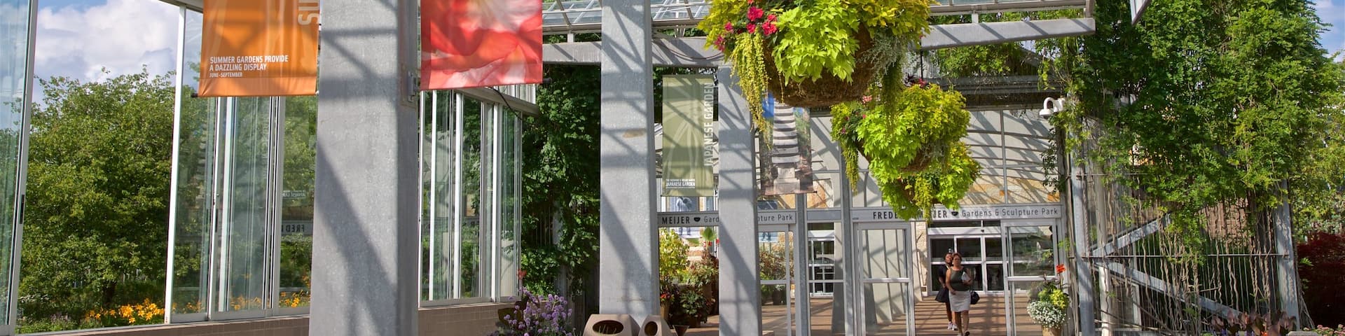 Frederik Meijer Gardens & Sculpture Park featuring signage and flowers