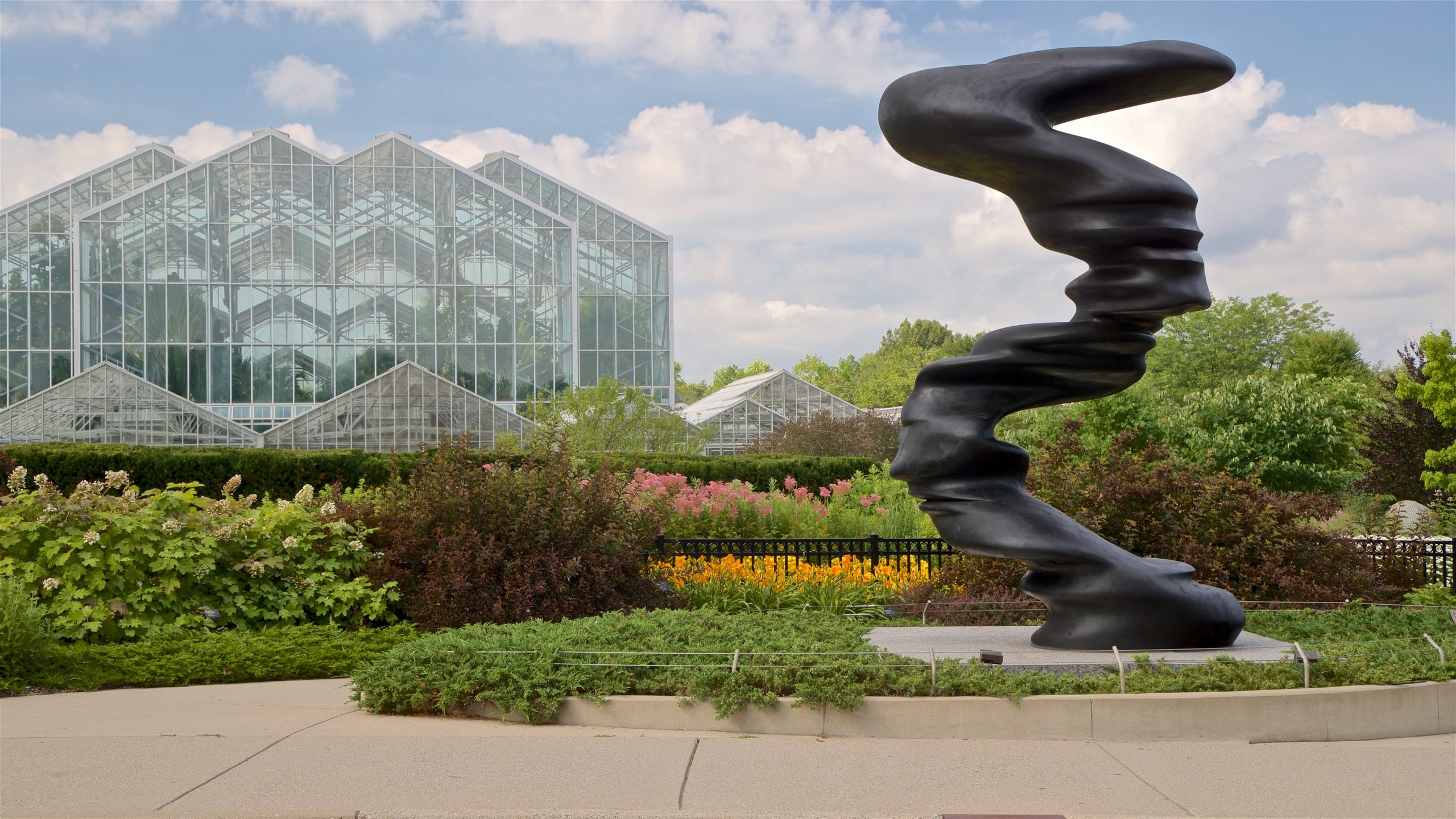 Frederik Meijer Gardens and Sculpture Park showing outdoor art and wild flowers