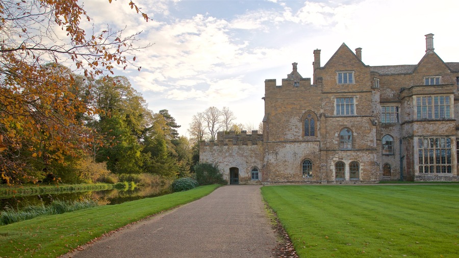 Broughton Castle featuring a river or creek and heritage architecture