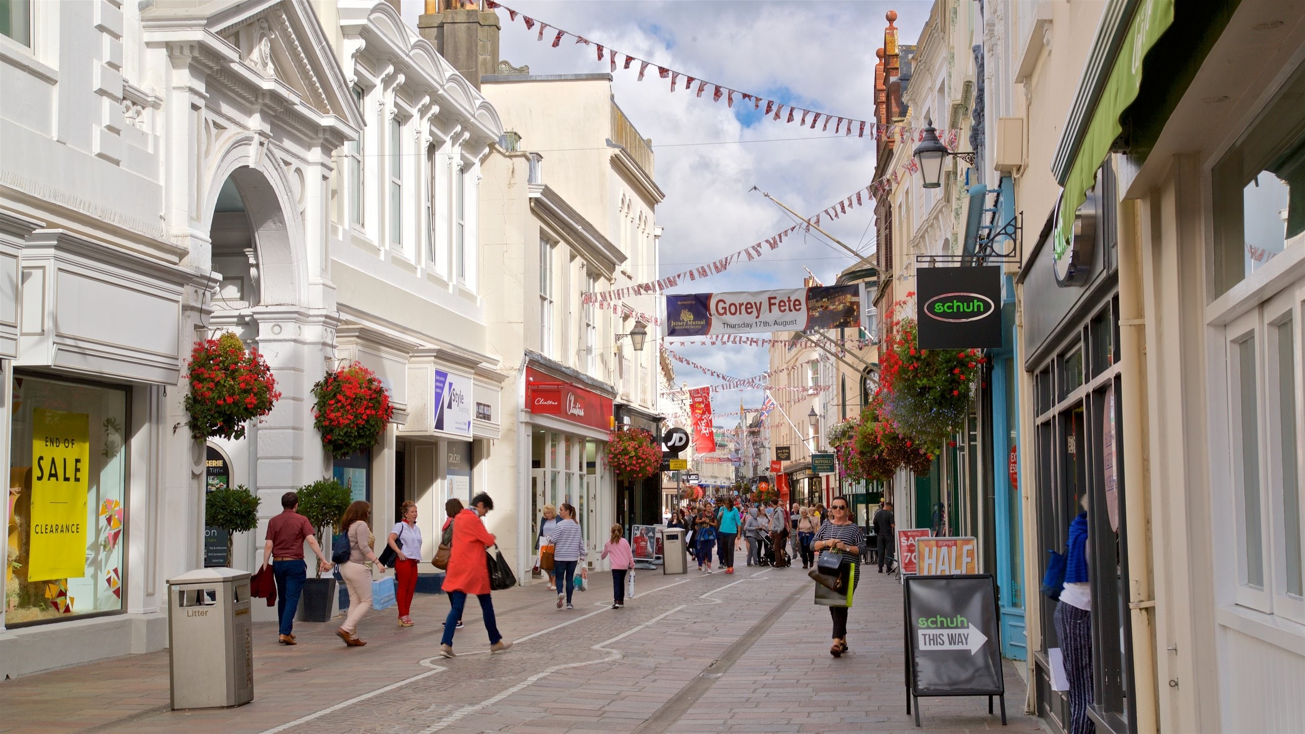 St. Helier which includes street scenes as well as a small group of people