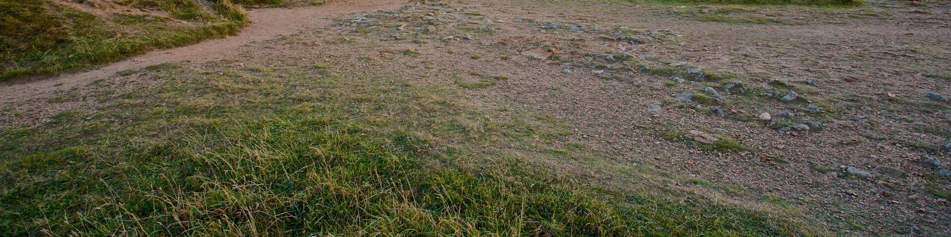 Grosnez Castle which includes landscape views, building ruins and general coastal views