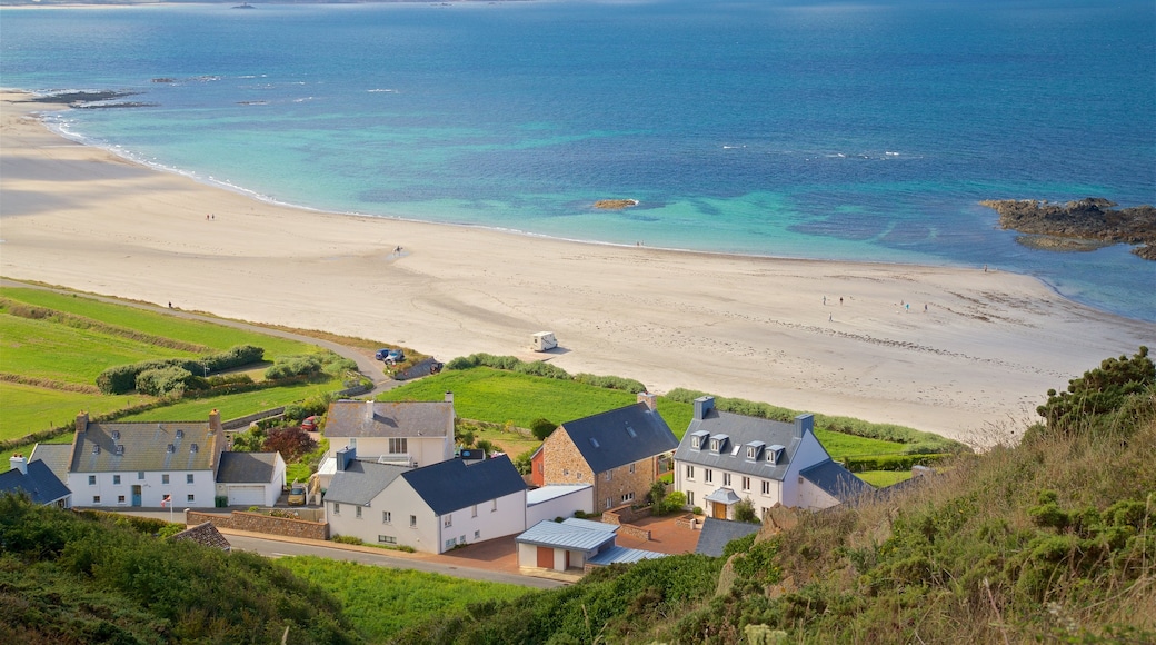 St Ouen showing a beach, a coastal town and landscape views