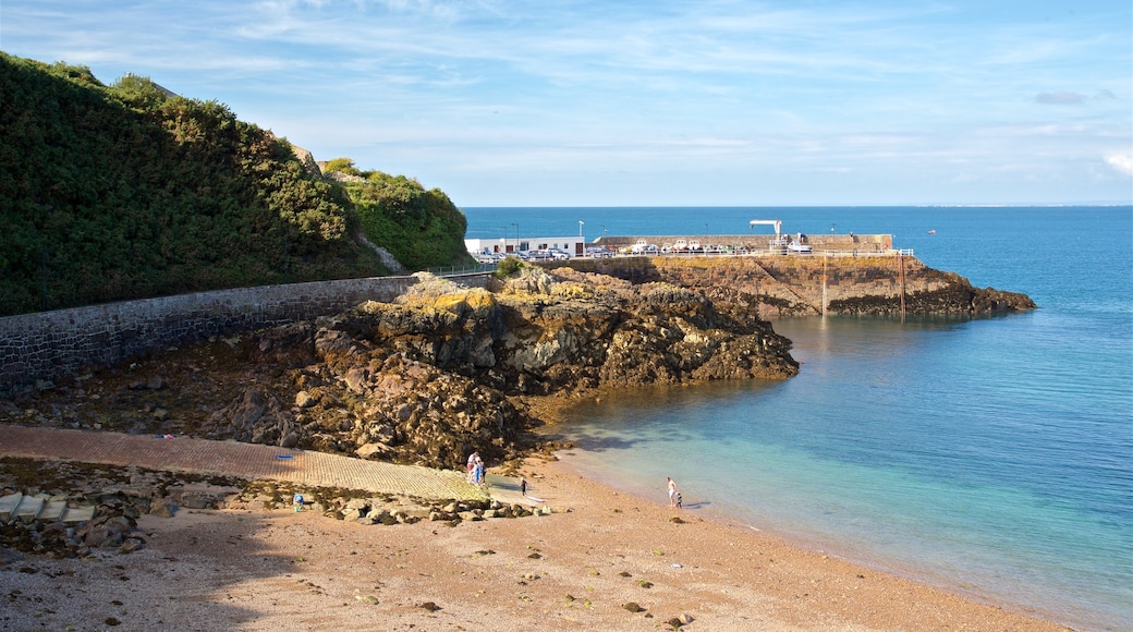 Bouley Bay showing general coastal views, rugged coastline and a pebble beach