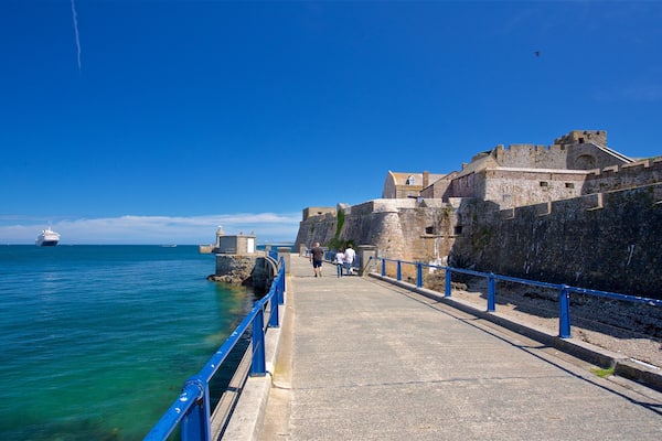 Castle Cornet which includes general coastal views, a bridge and heritage elements