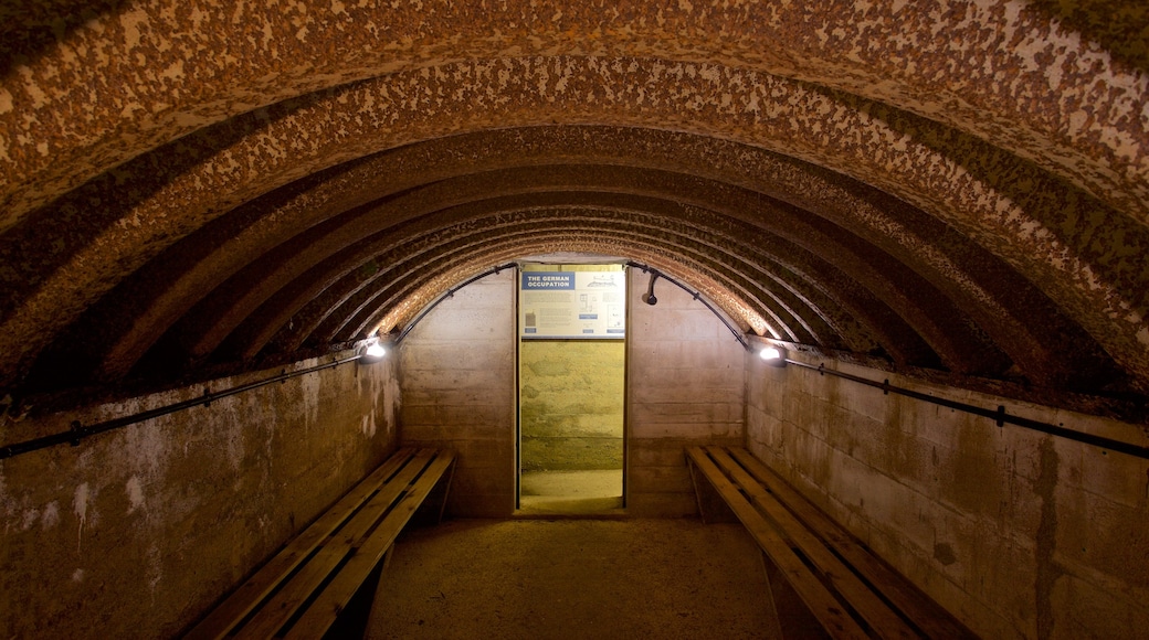 La Hougue Bie featuring interior views and signage