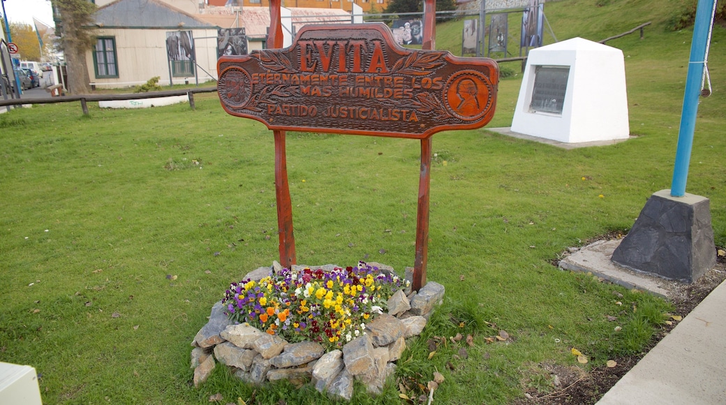 Government House featuring signage and flowers