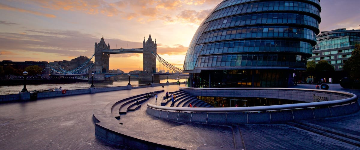 Tower Bridge featuring a sunset, modern architecture and a bridge