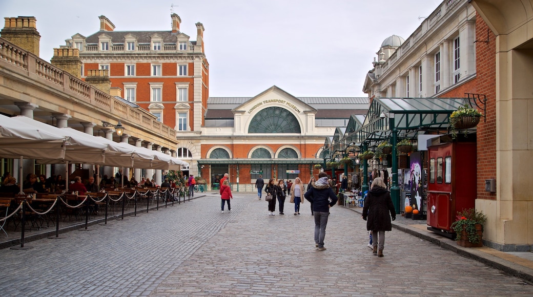 Covent Garden Market showing street scenes as well as a small group of people