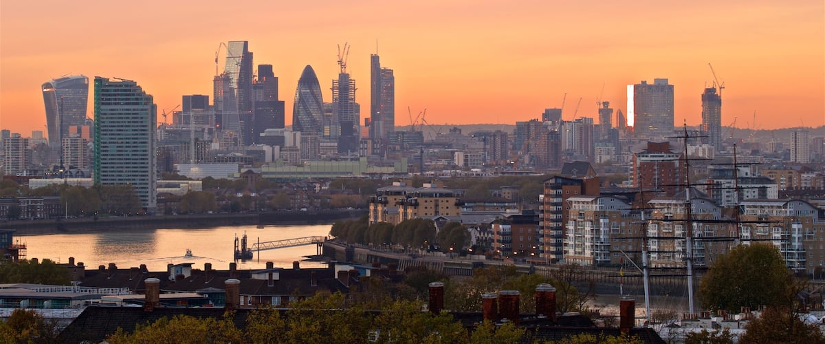 Greenwich Park showing a city, a river or creek and a sunset