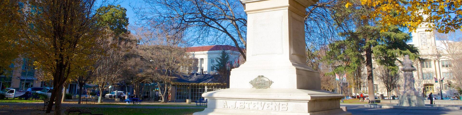 Cesar Chavez Park showing a garden, a monument and outdoor art