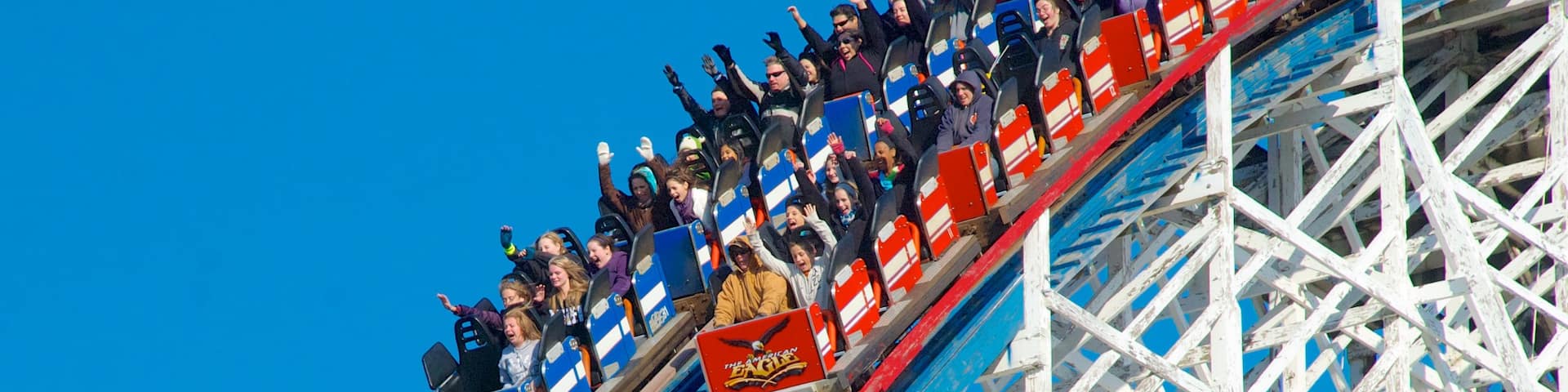 Six Flags Great America featuring rides as well as a large group of people