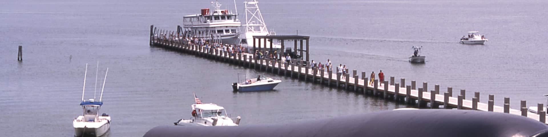 Mississippi showing military items, landscape views and a marina
