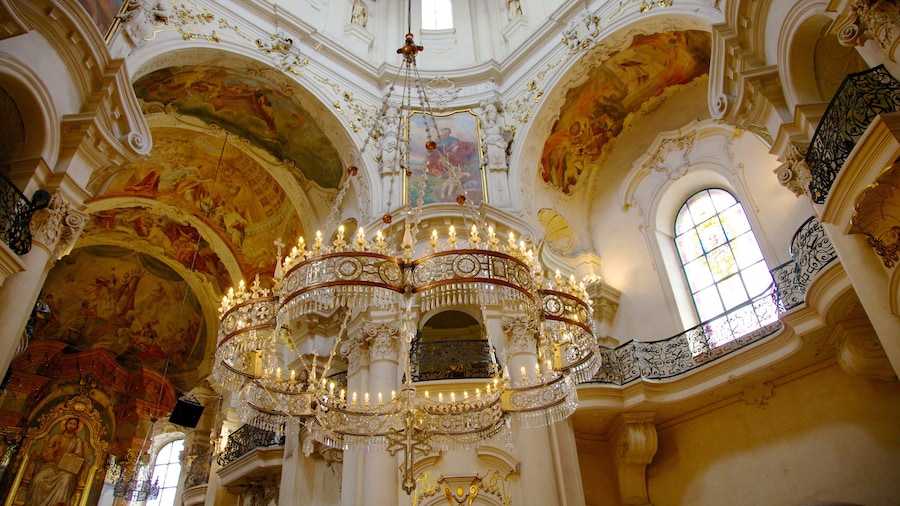 St. Nicholas Church at the Old Town Square featuring religious aspects, interior views and a church or cathedral