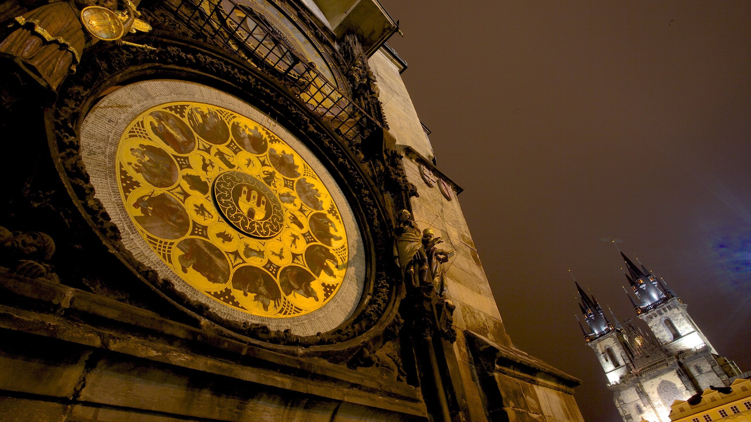 Prague which includes a church or cathedral, heritage architecture and night scenes