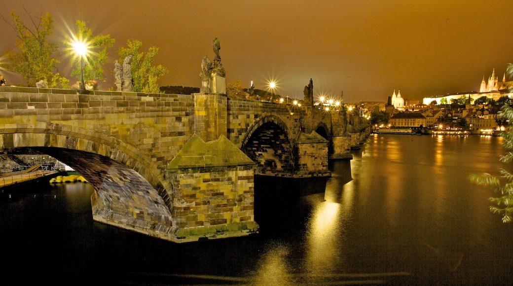 Czech Republic which includes night scenes, heritage architecture and a river or creek