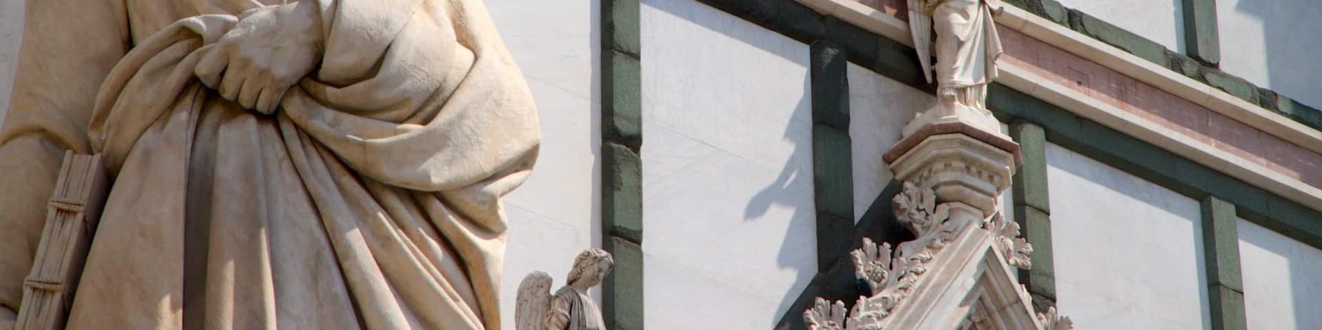 Basilica of Santa Croce which includes heritage architecture, a statue or sculpture and religious aspects