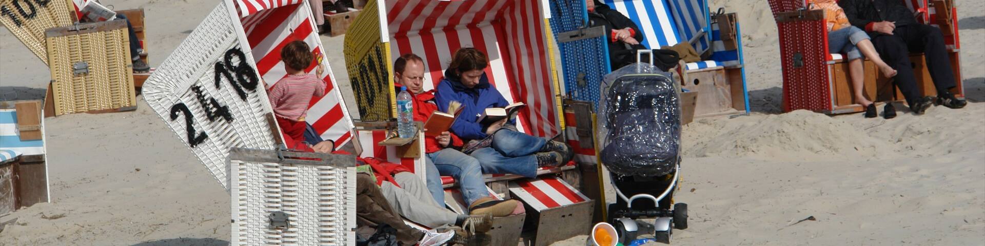 Langeoog showing a sandy beach as well as a couple
