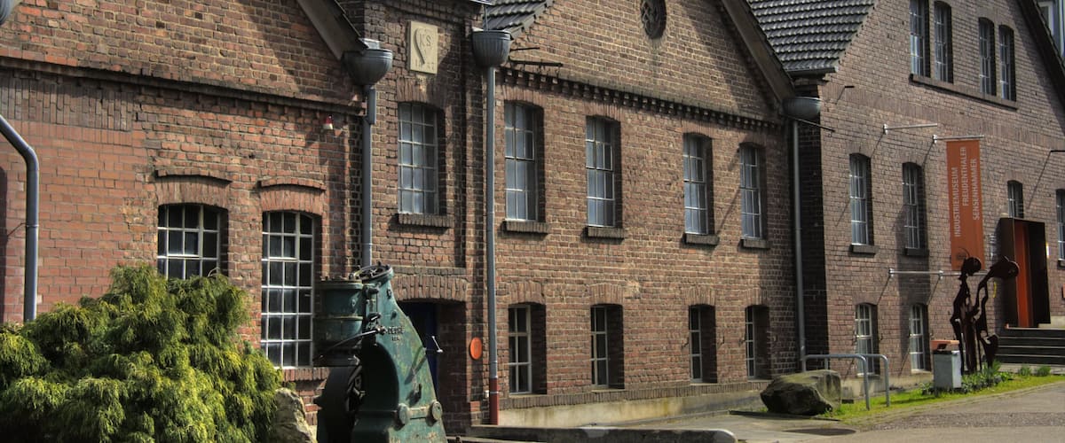 Leverkusen showing a small town or village, street scenes and a house