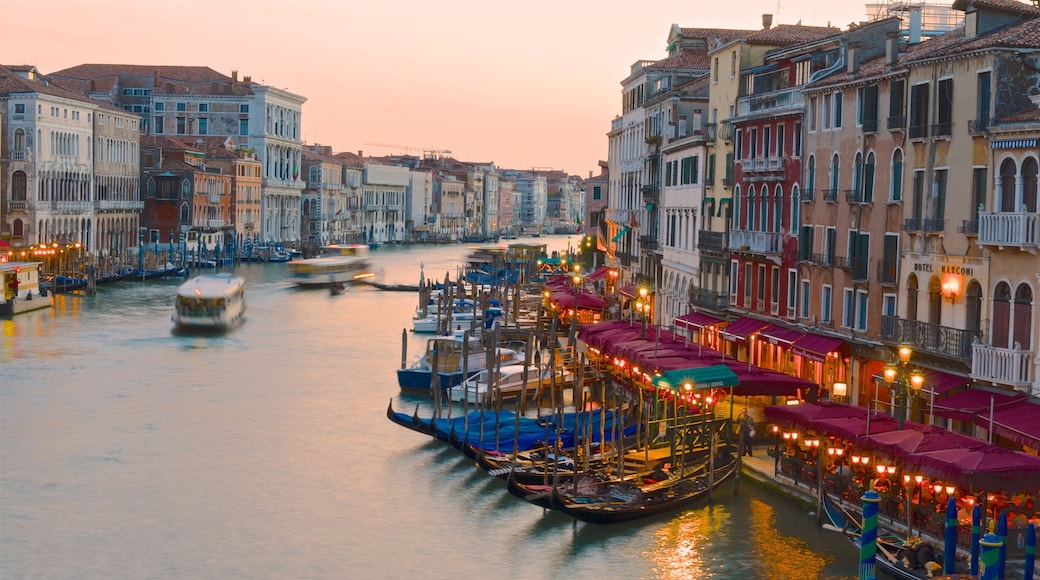 Grand Canal which includes a ferry, heritage architecture and a marina