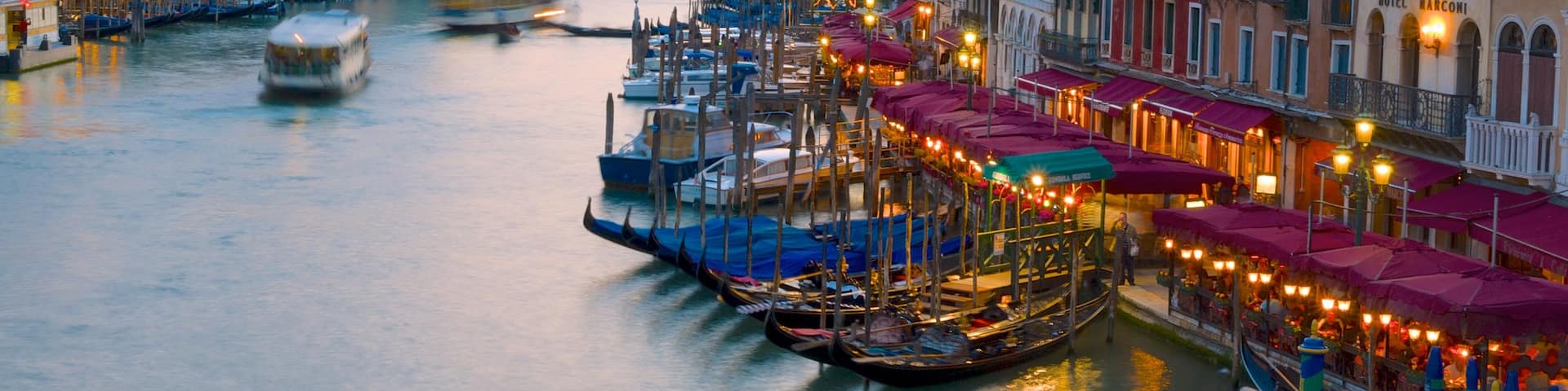 Grand Canal which includes a ferry, heritage architecture and a marina
