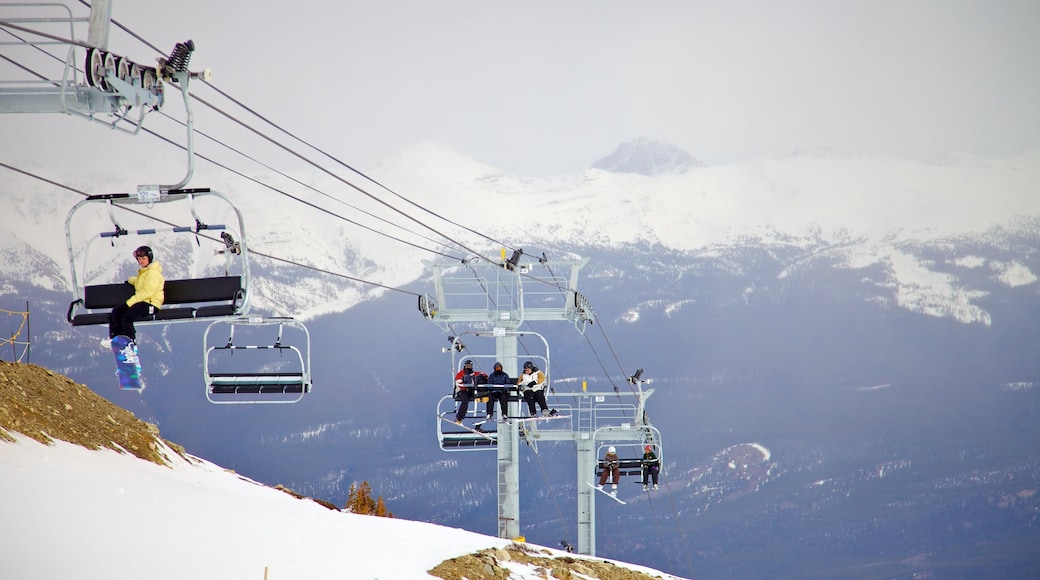 Jasper showing snow, a gondola and mountains