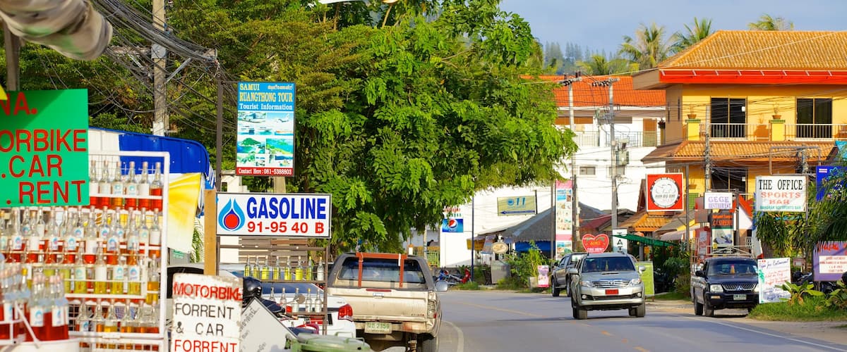 Bangrak Beach showing a small town or village, signage and street scenes