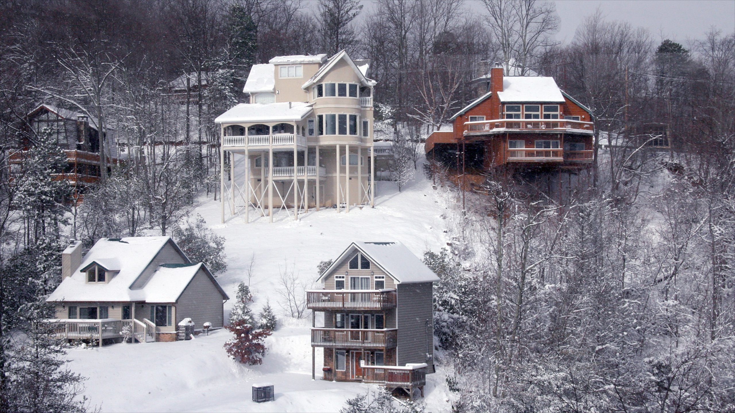 Gatlinburg which includes a house, snow and forests