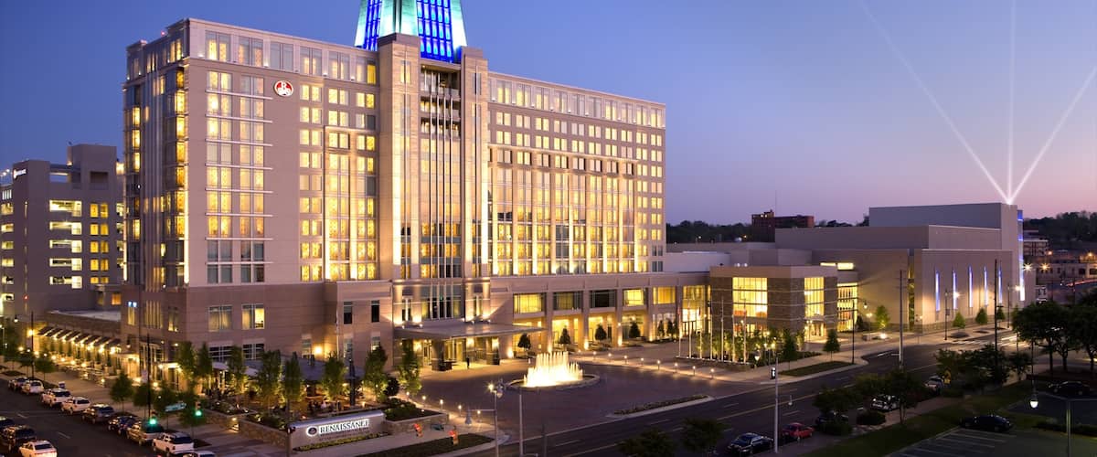Montgomery which includes night scenes, a hotel and skyline