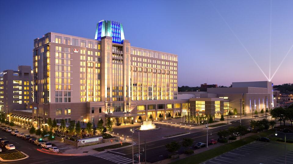 Montgomery which includes night scenes, a hotel and skyline