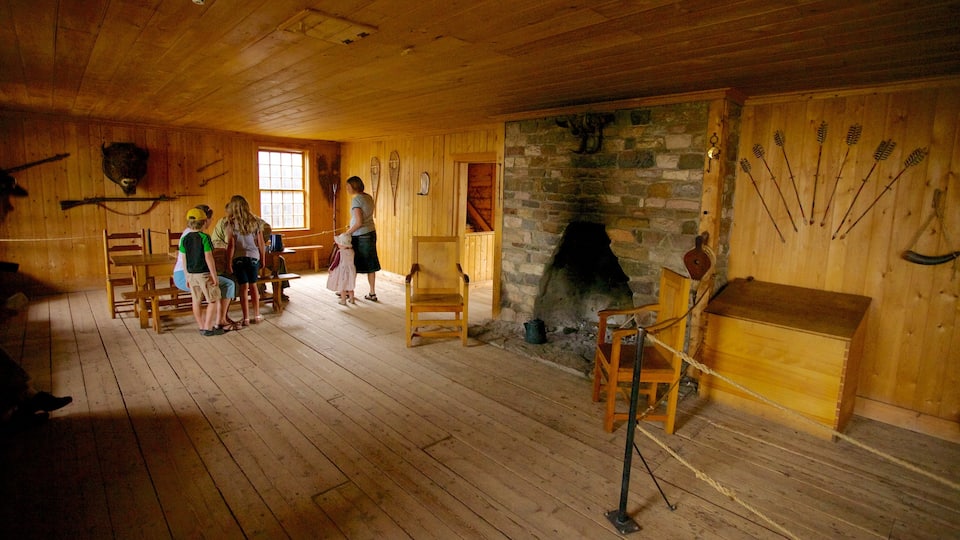 Fort Edmonton Park featuring interior views as well as a family