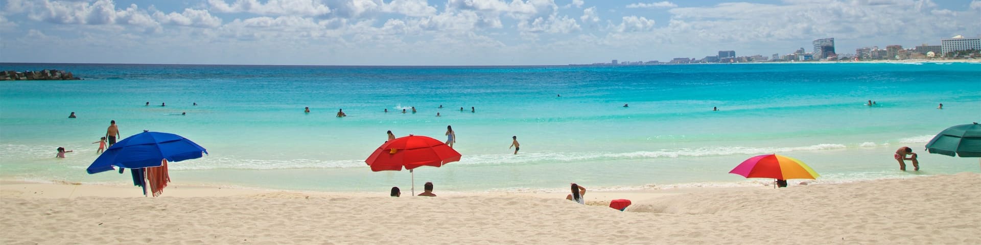 Gaviota Azul Beach which includes swimming, a sandy beach and tropical scenes