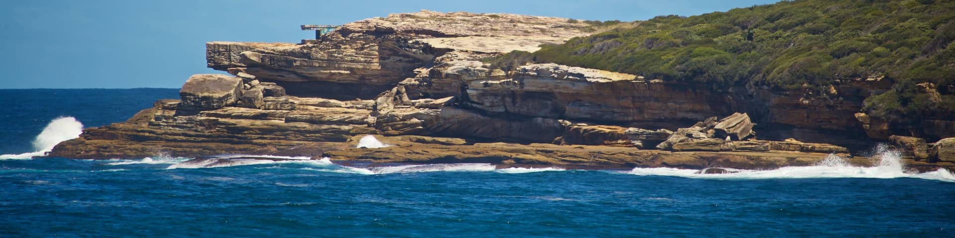 Maroubra Beach featuring rocky coastline and general coastal views