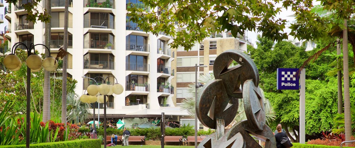 El Alamein Fountain featuring a garden and outdoor art