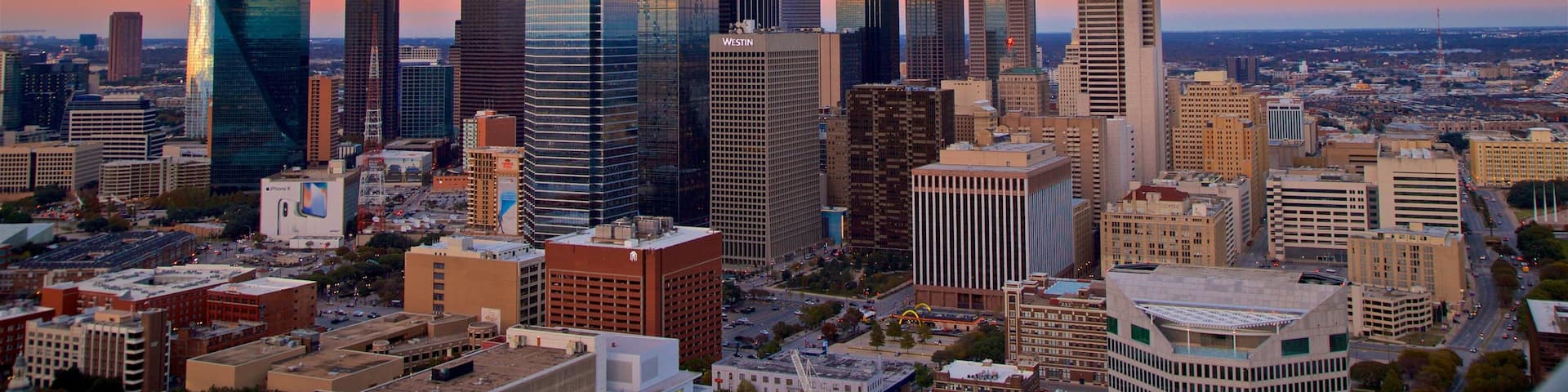 Reunion Tower which includes landscape views, a skyscraper and a sunset