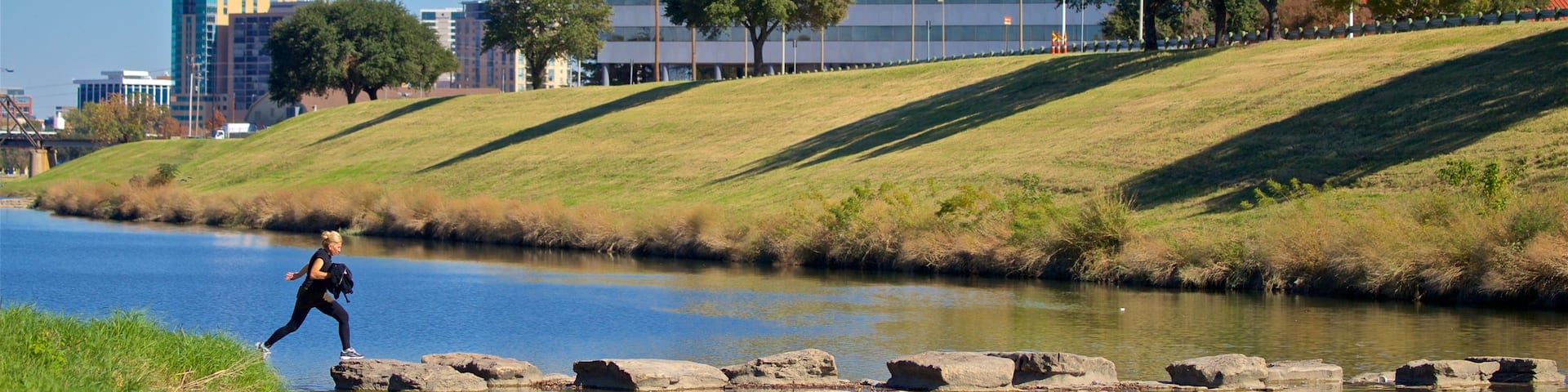 Trinity Park showing a river or creek as well as an individual female