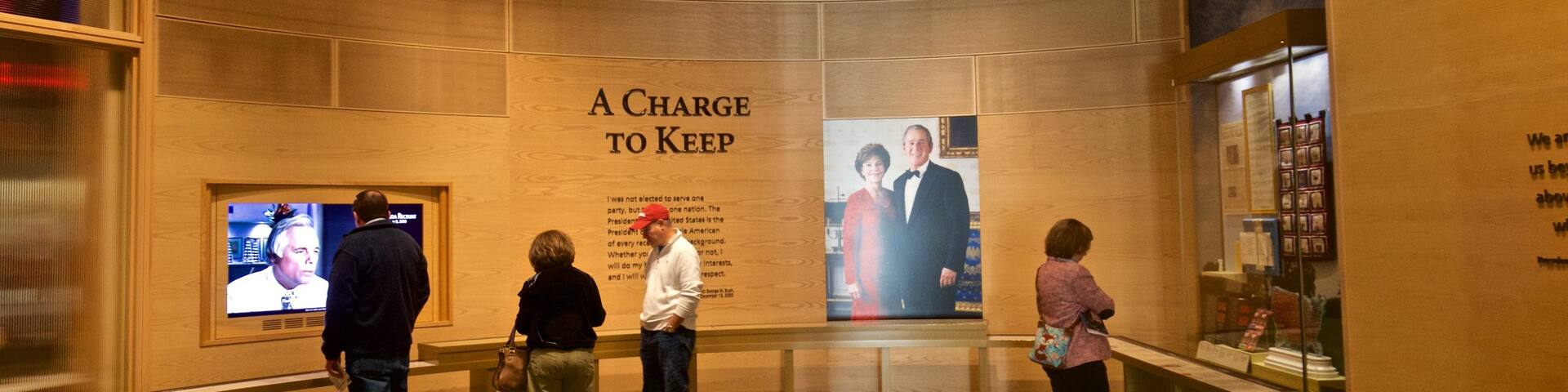 George W Bush Presidential Library and Museum featuring interior views as well as a small group of people