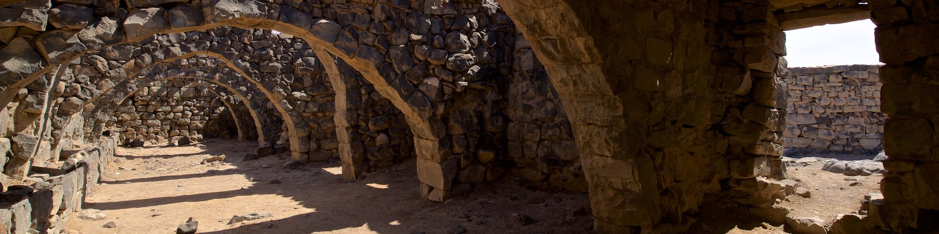 Qasr al-Azraq showing building ruins, heritage elements and interior views