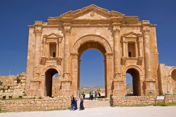 Hadrian\'s Arch which includes heritage architecture as well as a small group of people