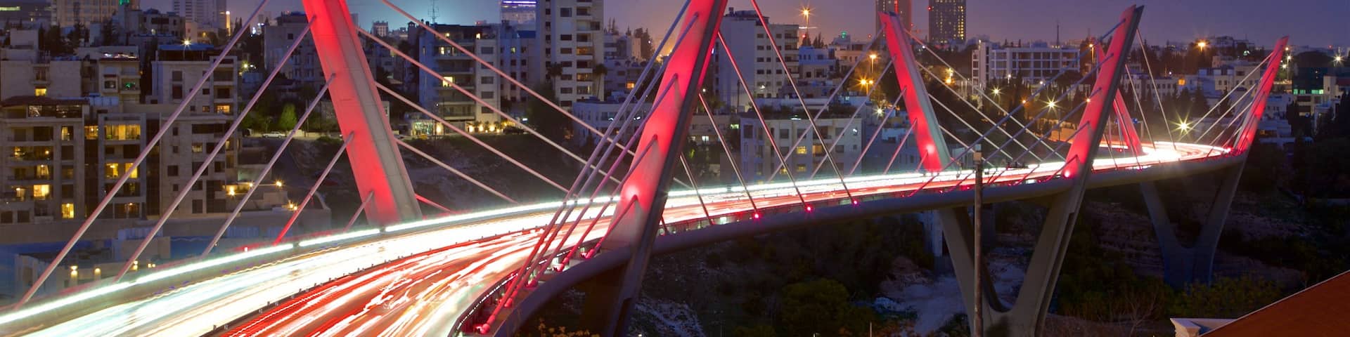 Abdoun Bridge featuring night scenes, a city and a bridge