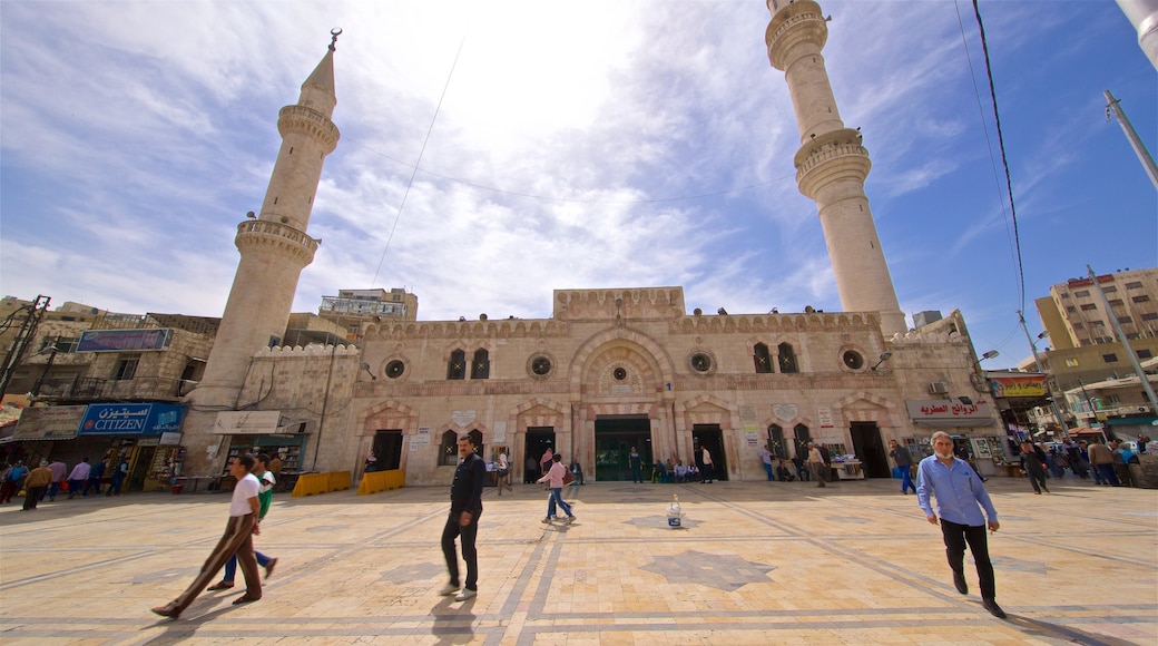 King Hussein Mosque featuring a square or plaza, street scenes and heritage architecture