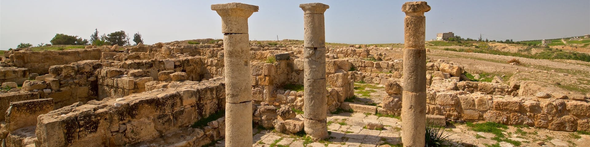 Pella Museum featuring building ruins, heritage elements and landscape views